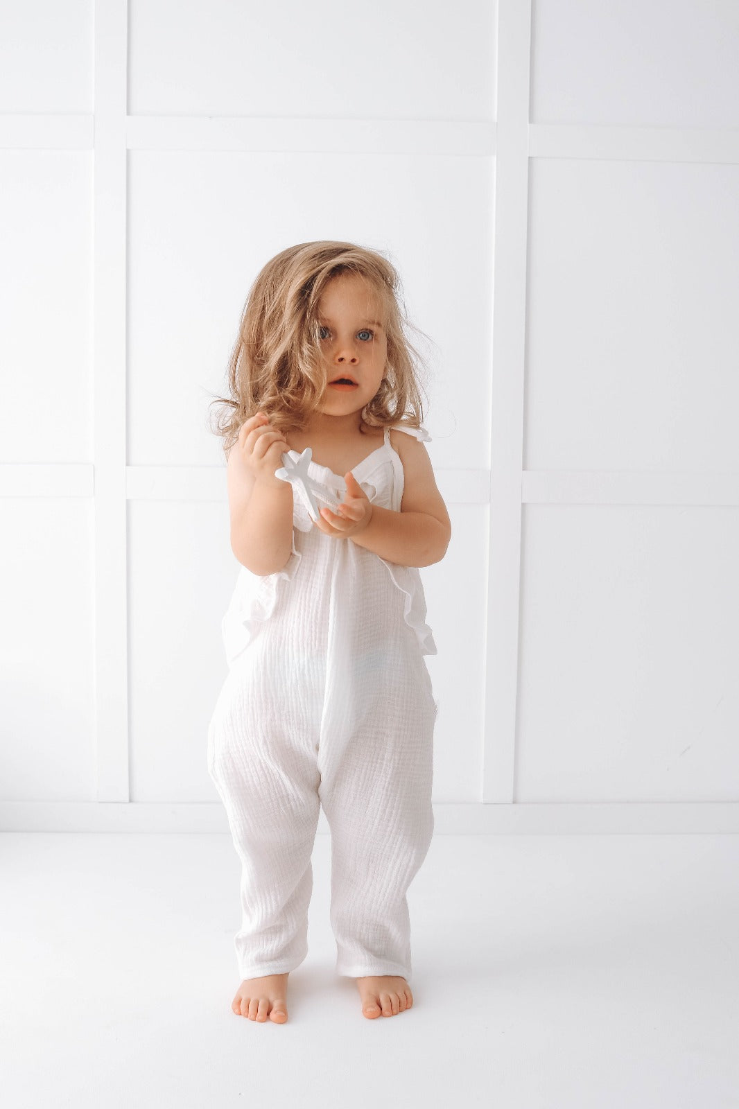 Muslin long leg romper with ruffles - pure white