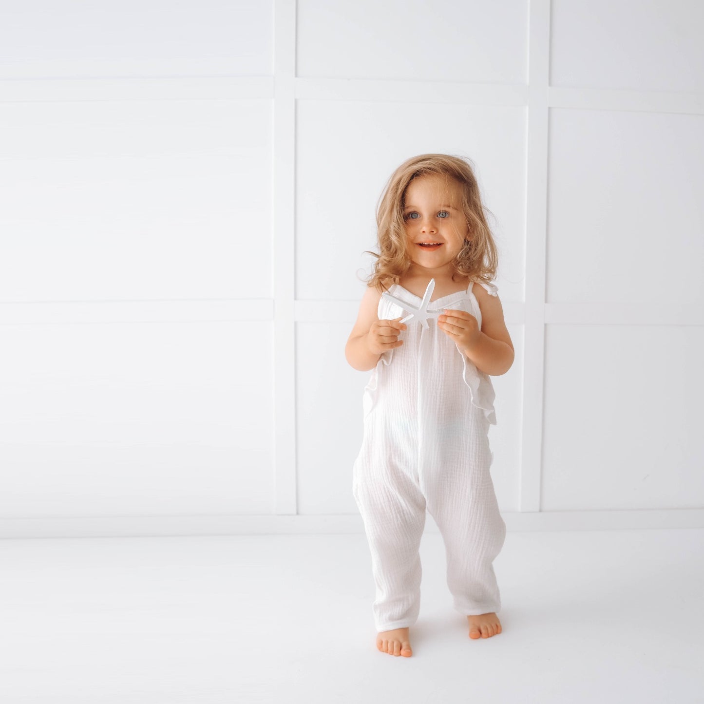 Muslin long leg romper with ruffles - pure white