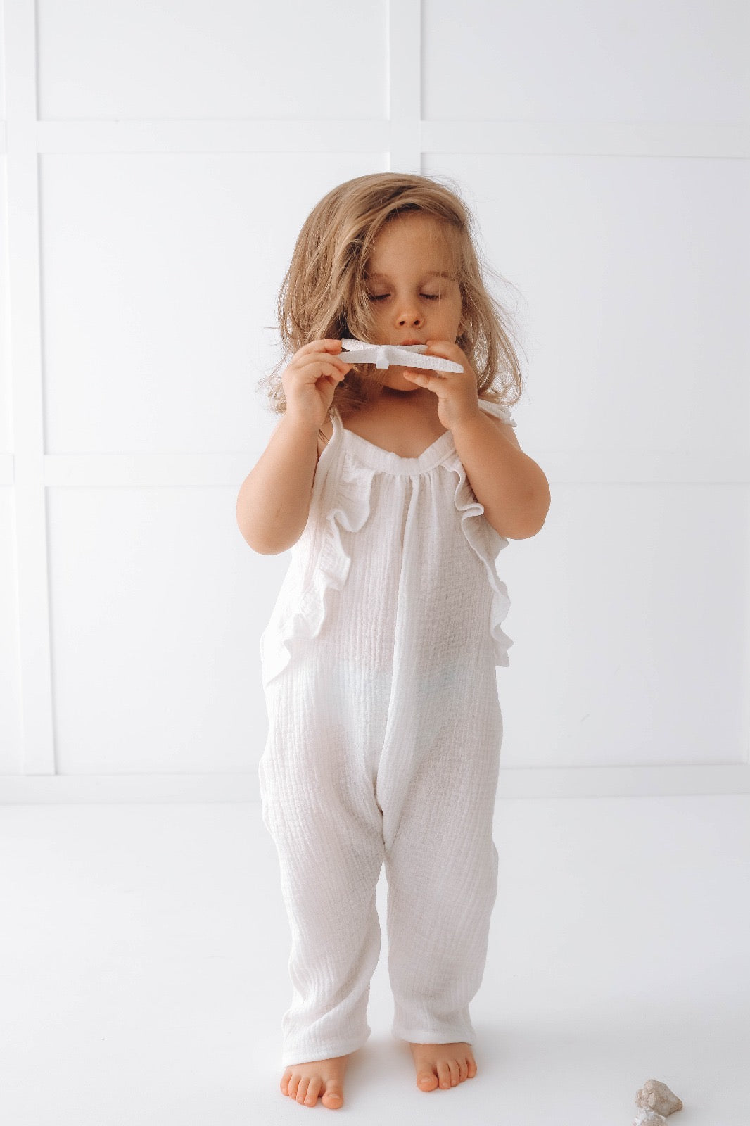 Muslin long leg romper with ruffles - pure white