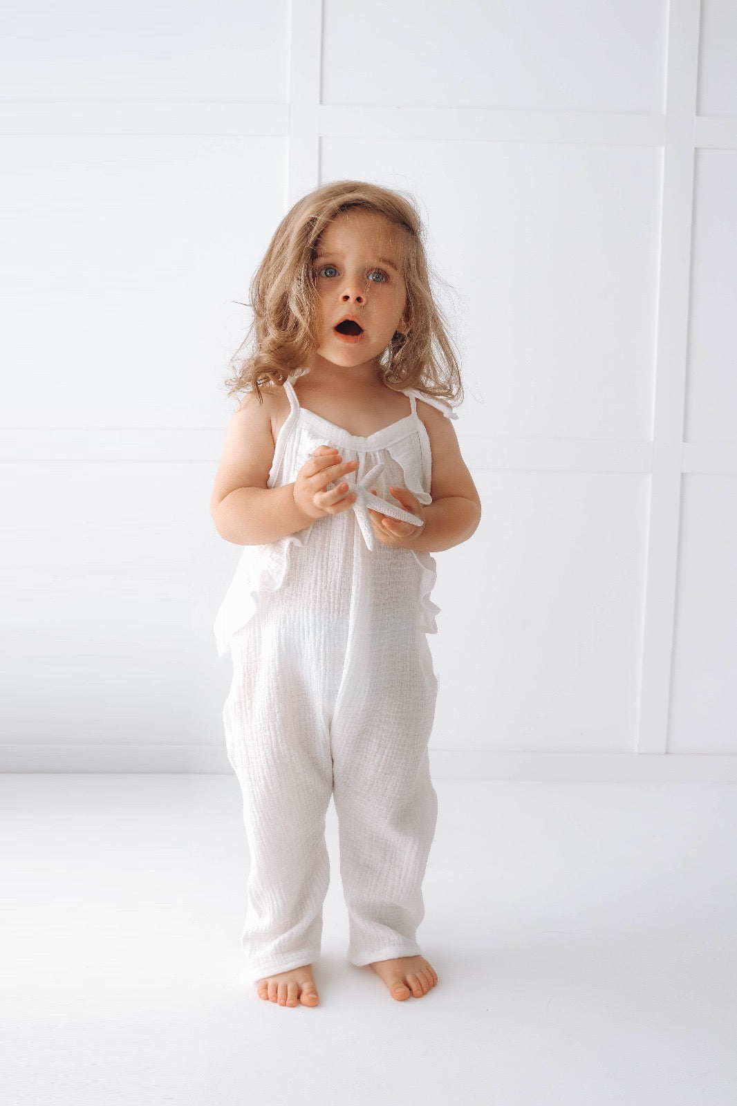 Muslin long leg romper with ruffles - pure white