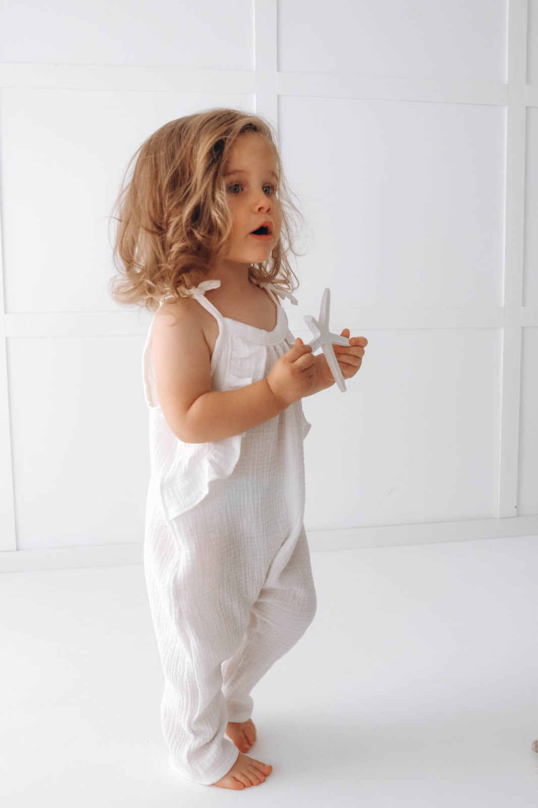 Muslin long leg romper with ruffles - pure white
