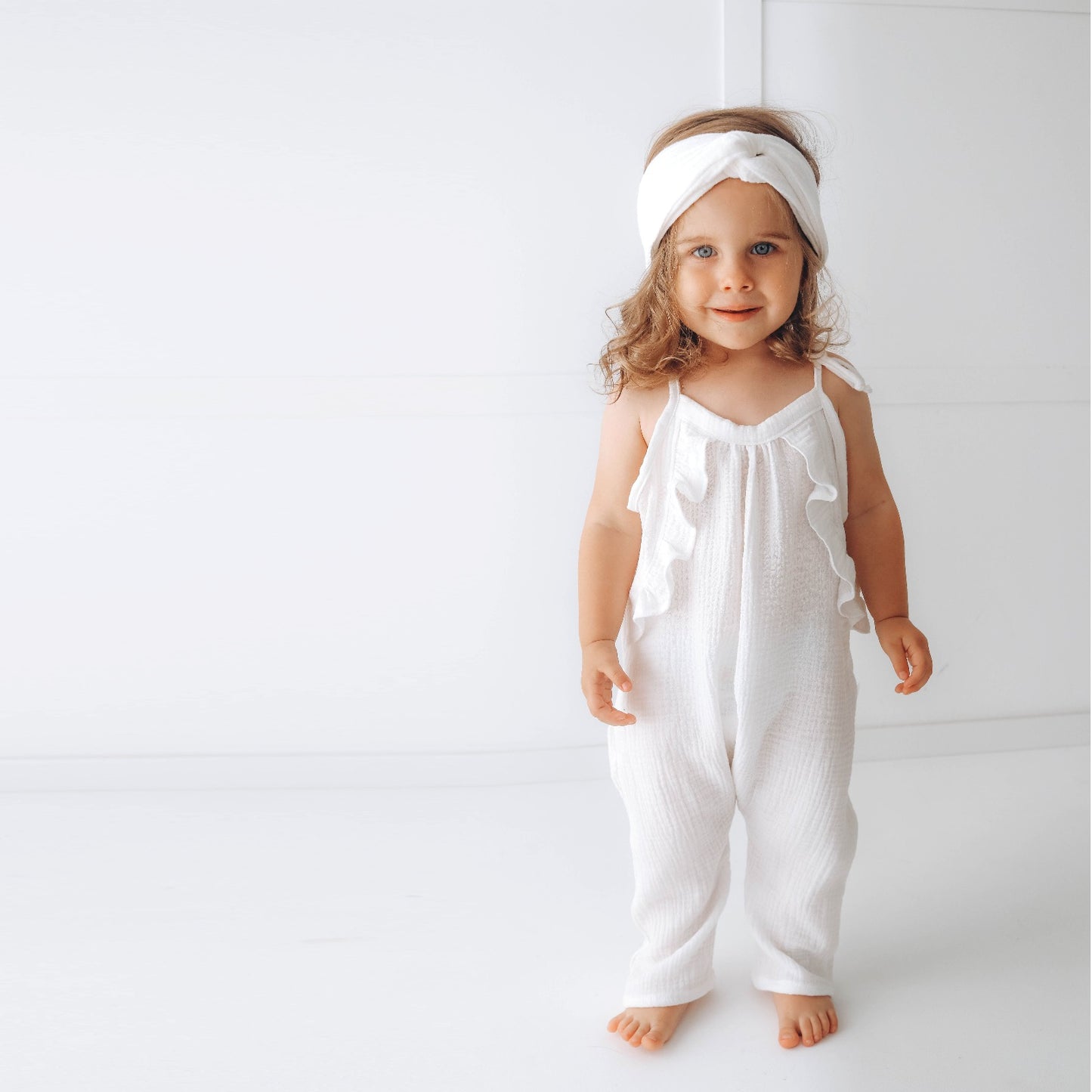 Muslin long leg romper with ruffles - pure white