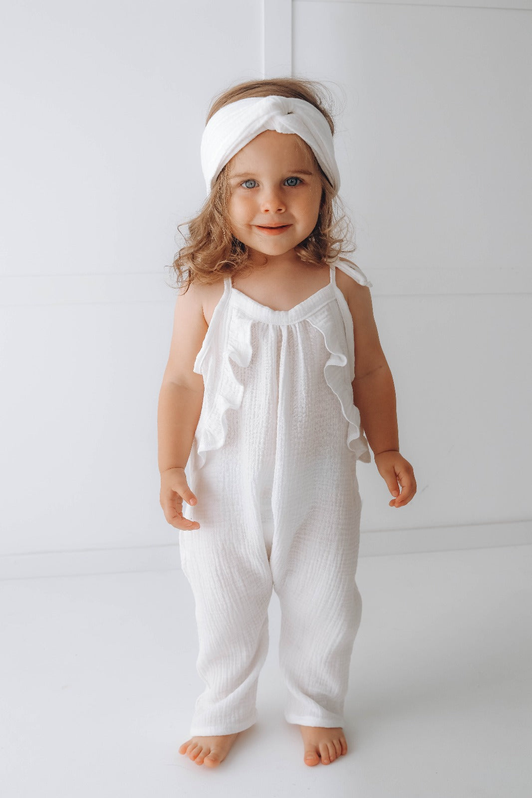 Muslin long leg romper with ruffles - pure white