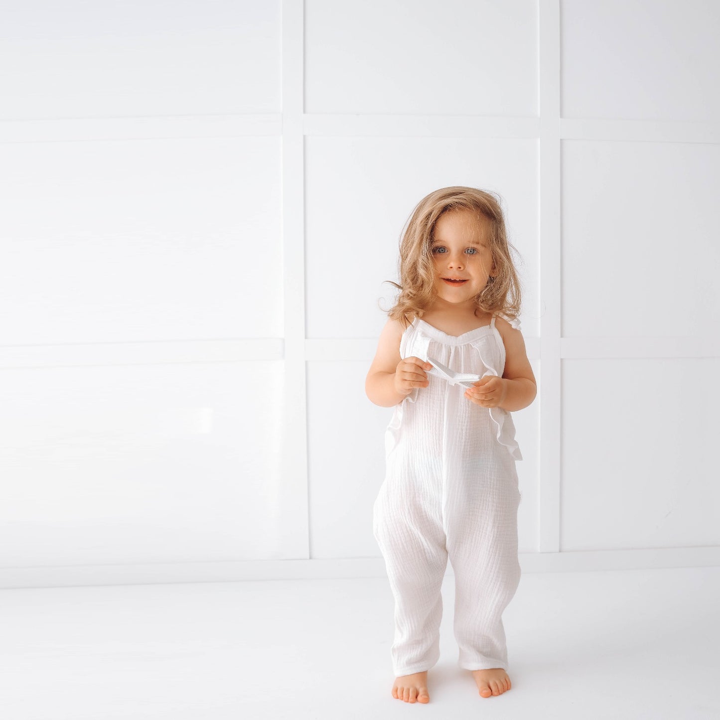 Muslin long leg romper with ruffles - pure white