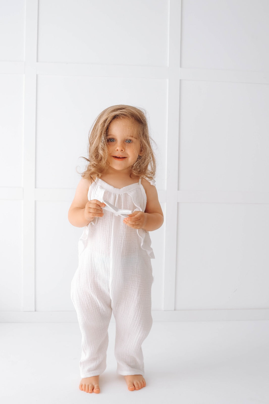 Muslin long leg romper with ruffles - pure white