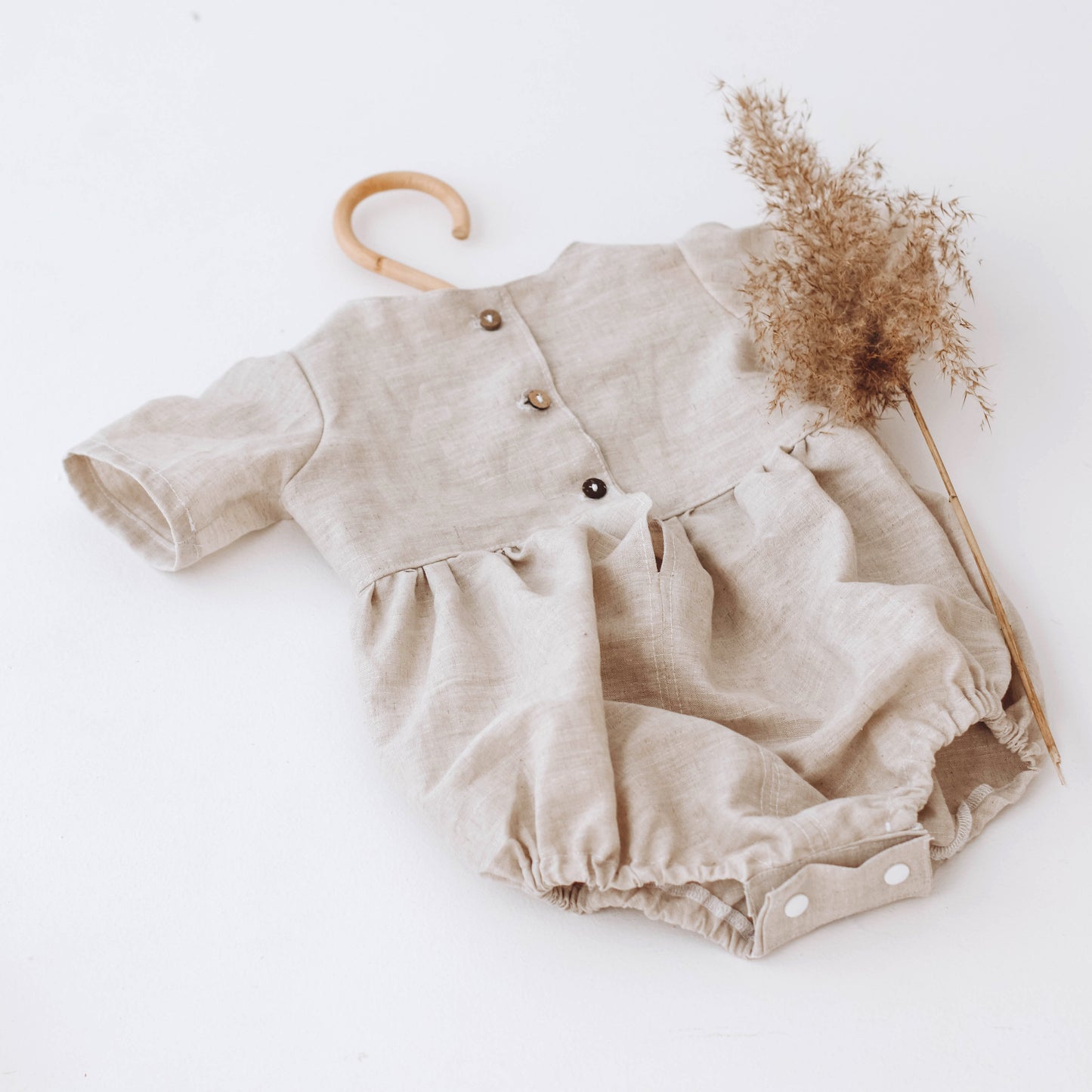 Linen romper with short sleeves