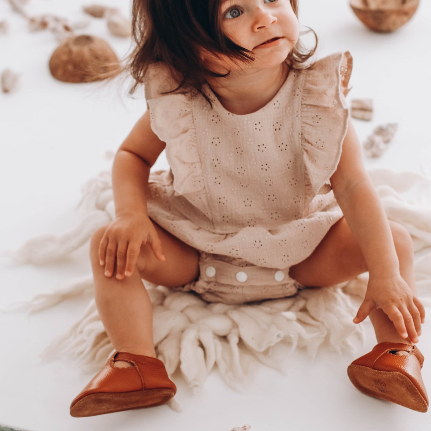 Embroidered muslin romper with frills