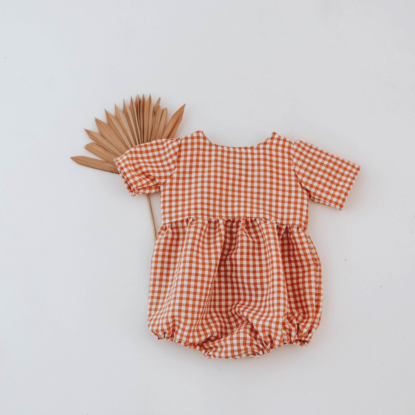Gingham romper with short sleeves